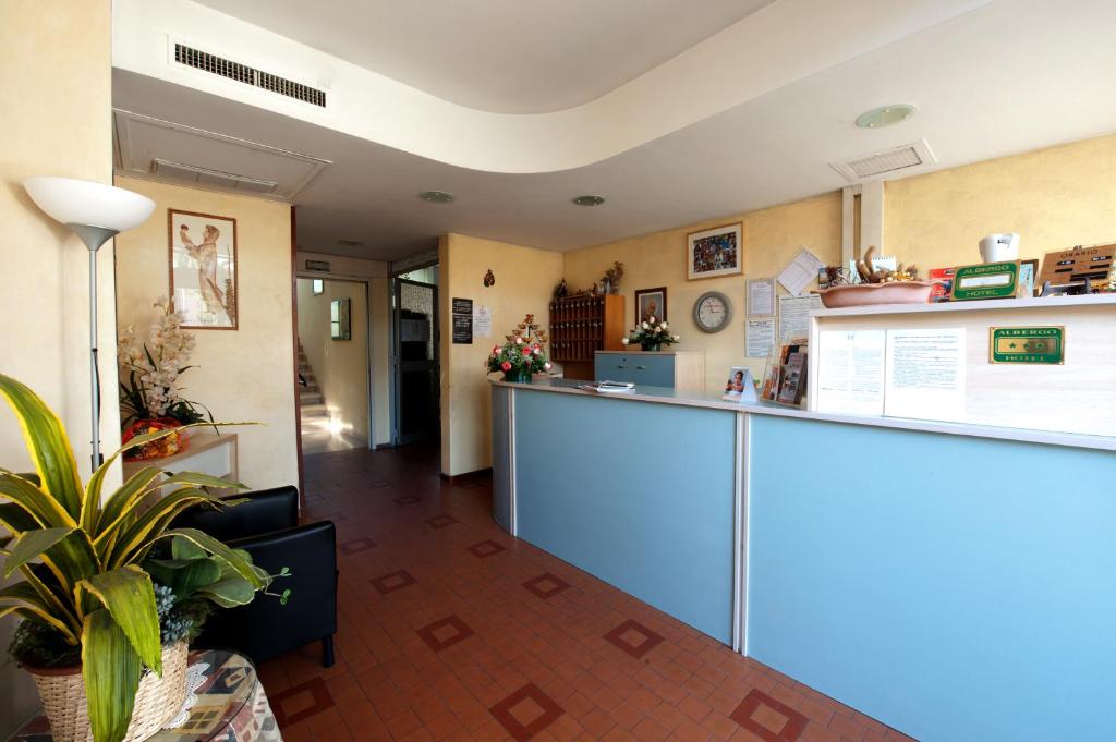 Kuchyň nebo kuchyňský kout v ubytování Hotel Roma