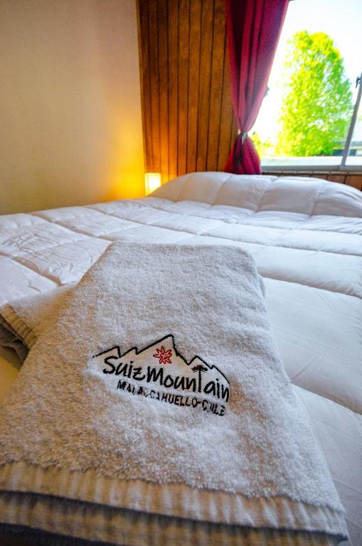 Voodi või voodid majutusasutuse SuizMountain toas