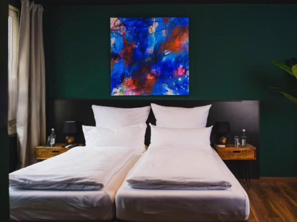Postel nebo postele na pokoji v ubytování Friedrich DAS BETT