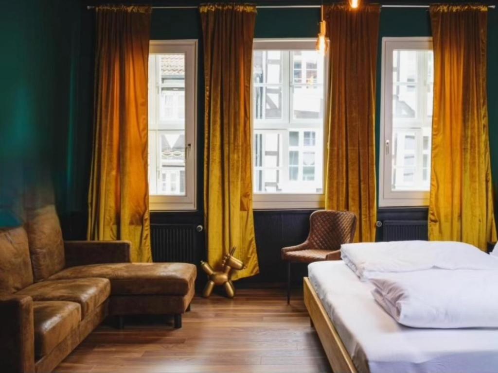 Postel nebo postele na pokoji v ubytování Friedrich DAS BETT