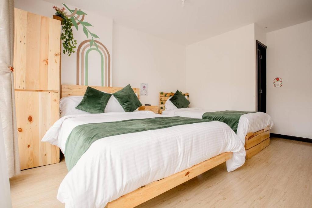 Postel nebo postele na pokoji v ubytování Hotel Natural Sevgi