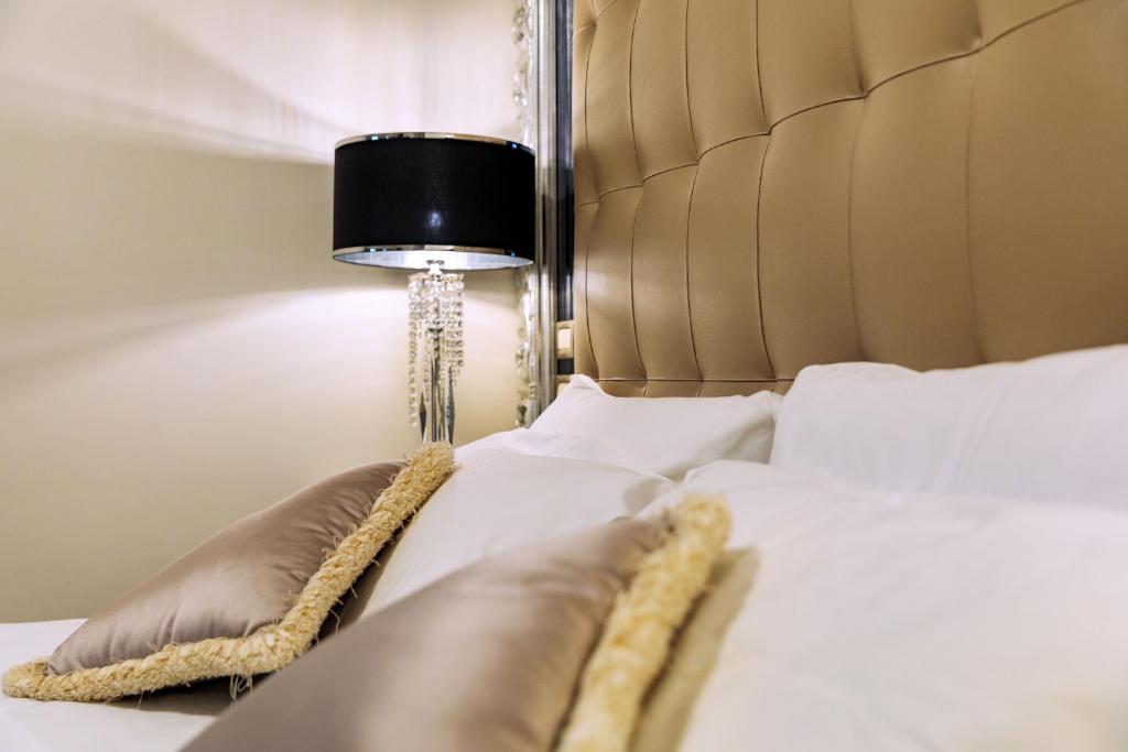 Postel nebo postele na pokoji v ubytování Villa Palma by AGF Hotels