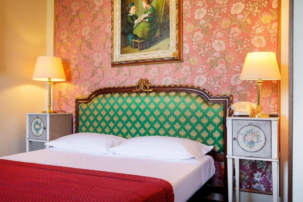 Postel nebo postele na pokoji v ubytování Villa Palma by AGF Hotels