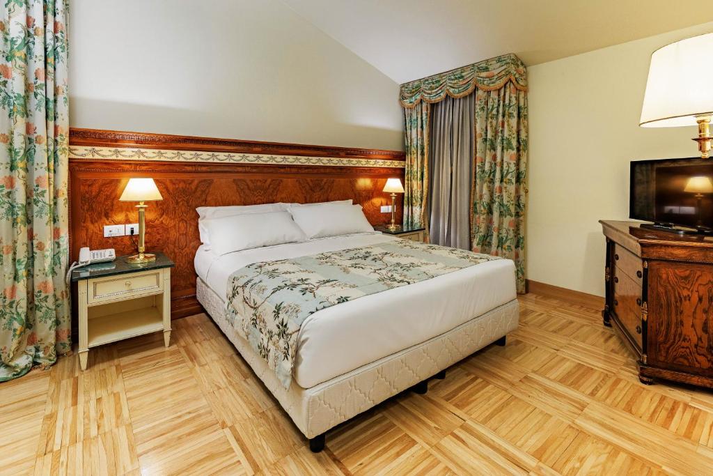 Postel nebo postele na pokoji v ubytování Villa Palma by AGF Hotels