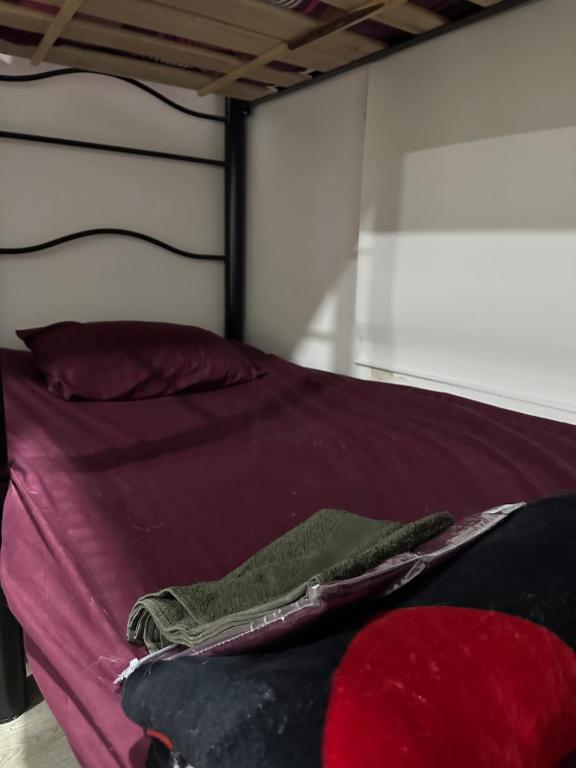 Postel nebo postele na pokoji v ubytování Davinci 1903 Bed & breakfast centro histórico Bogotá
