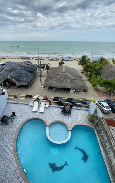 Bazén v ubytování Hotel Atacames Inn nebo v jeho okolí