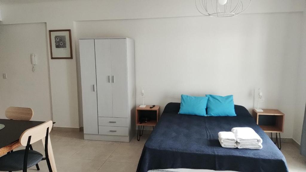 Postel nebo postele na pokoji v ubytování Leviosa- departamento nuevo con parrilla en el balcón