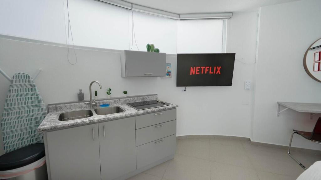 Kuchyň nebo kuchyňský kout v ubytování Aquaville Dorado Moderna A Studio 7