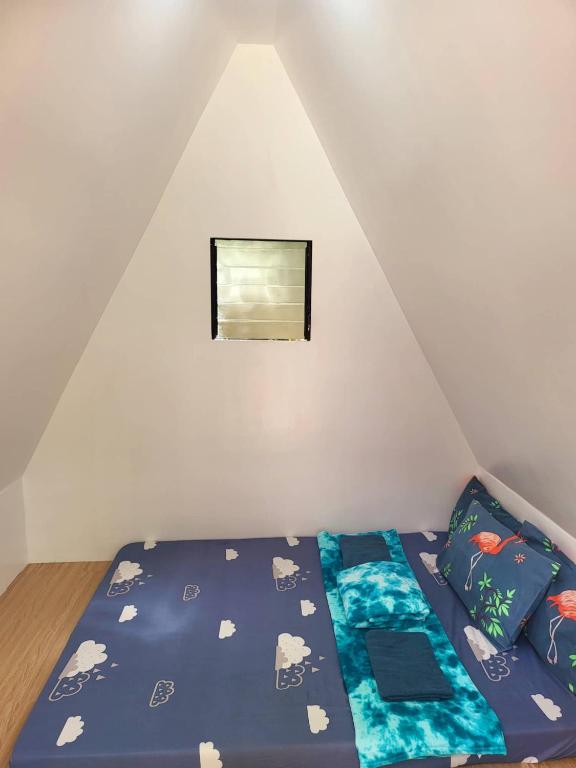 Postel nebo postele na pokoji v ubytování Glamping at Le' Antonia's Farm