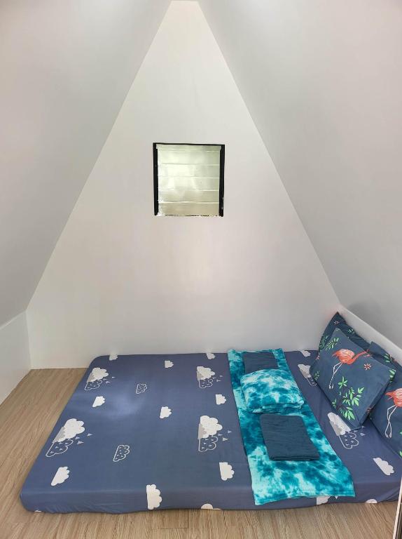 Postel nebo postele na pokoji v ubytování Glamping at Le' Antonia's Farm