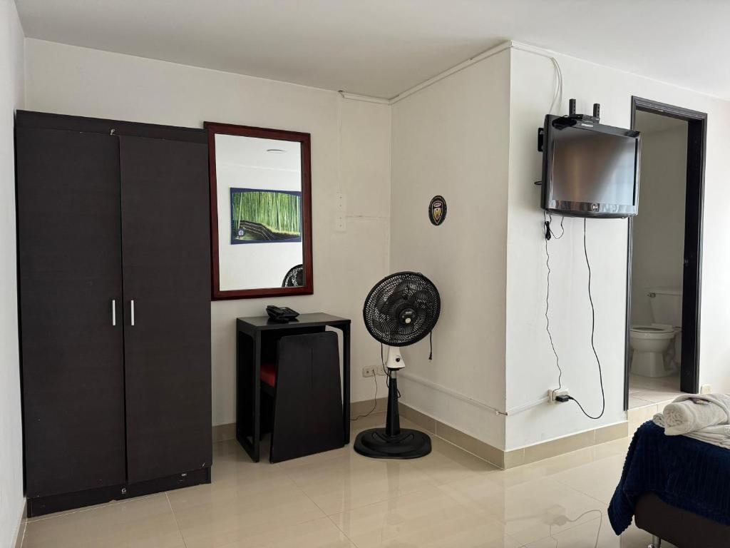 TV a/nebo společenská místnost v ubytování Hotel Catalina Plaza Pereira