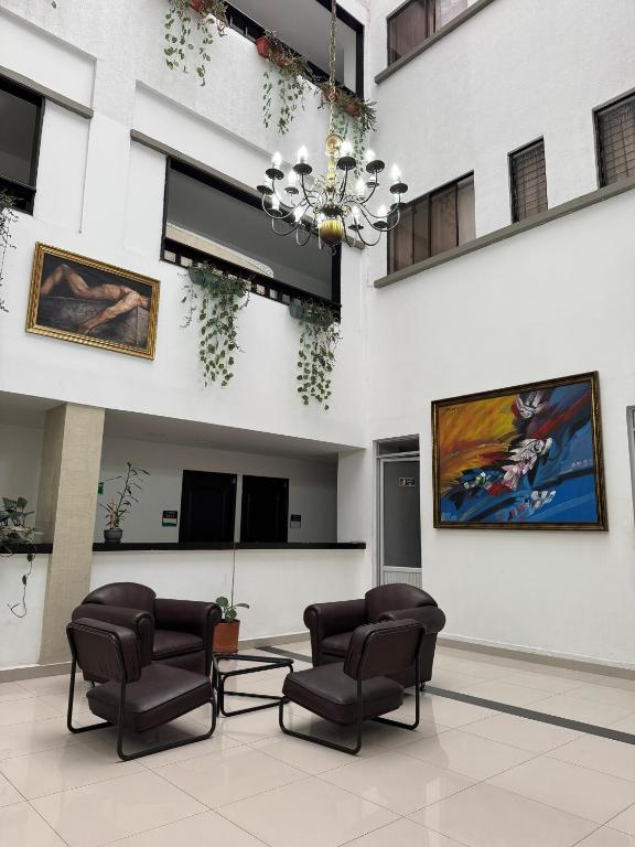 TV a/nebo společenská místnost v ubytování Hotel Catalina Plaza Pereira