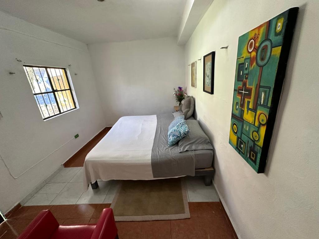 Ліжко або ліжка в номері Hostal Chirrín