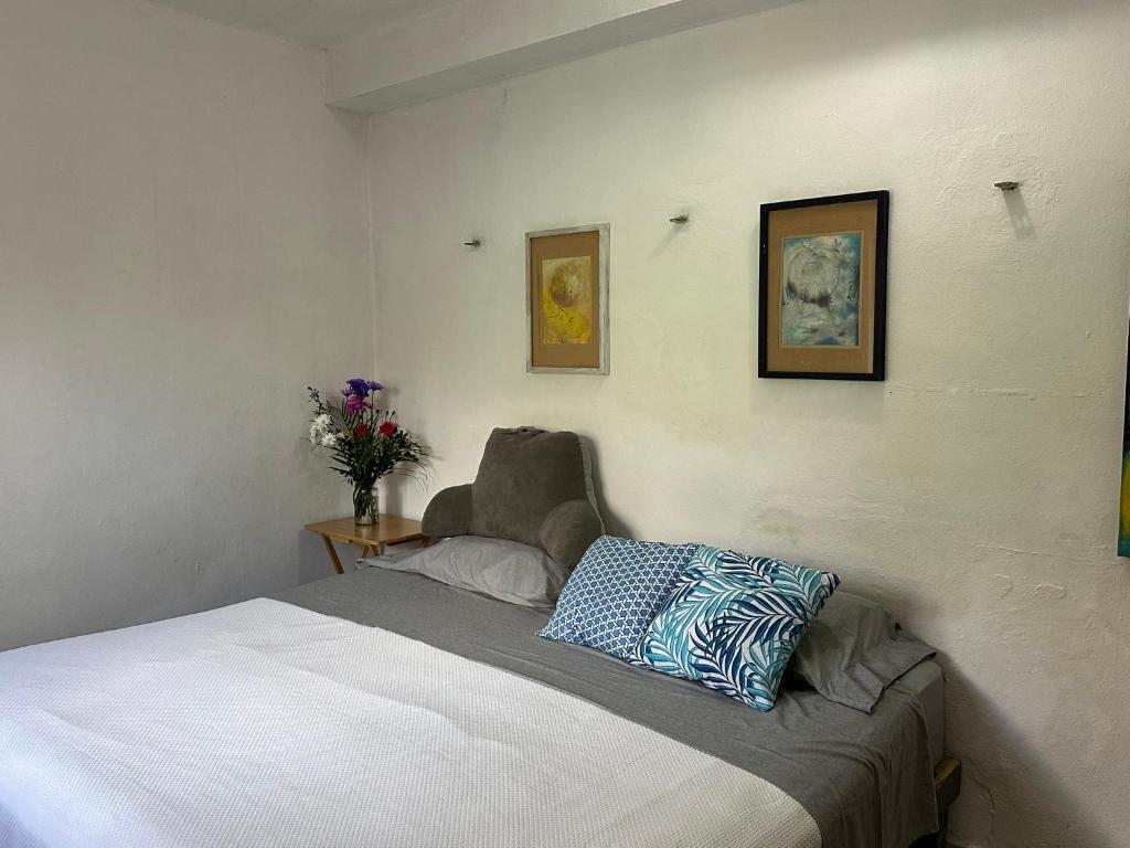 Ліжко або ліжка в номері Hostal Chirrín