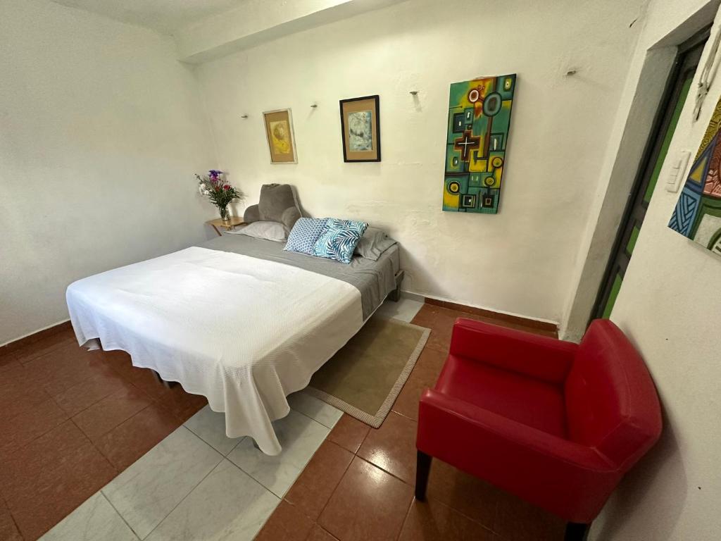 Ліжко або ліжка в номері Hostal Chirrín