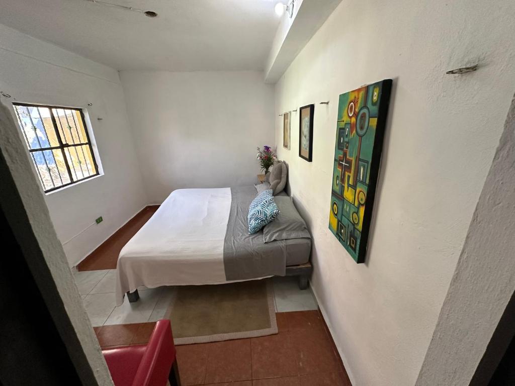 Ліжко або ліжка в номері Hostal Chirrín