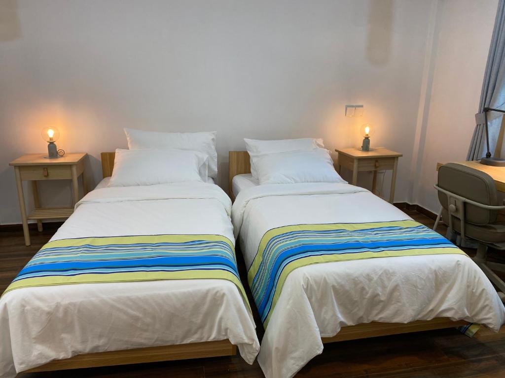 Postel nebo postele na pokoji v ubytování Entire Home - Calm Beach Inn