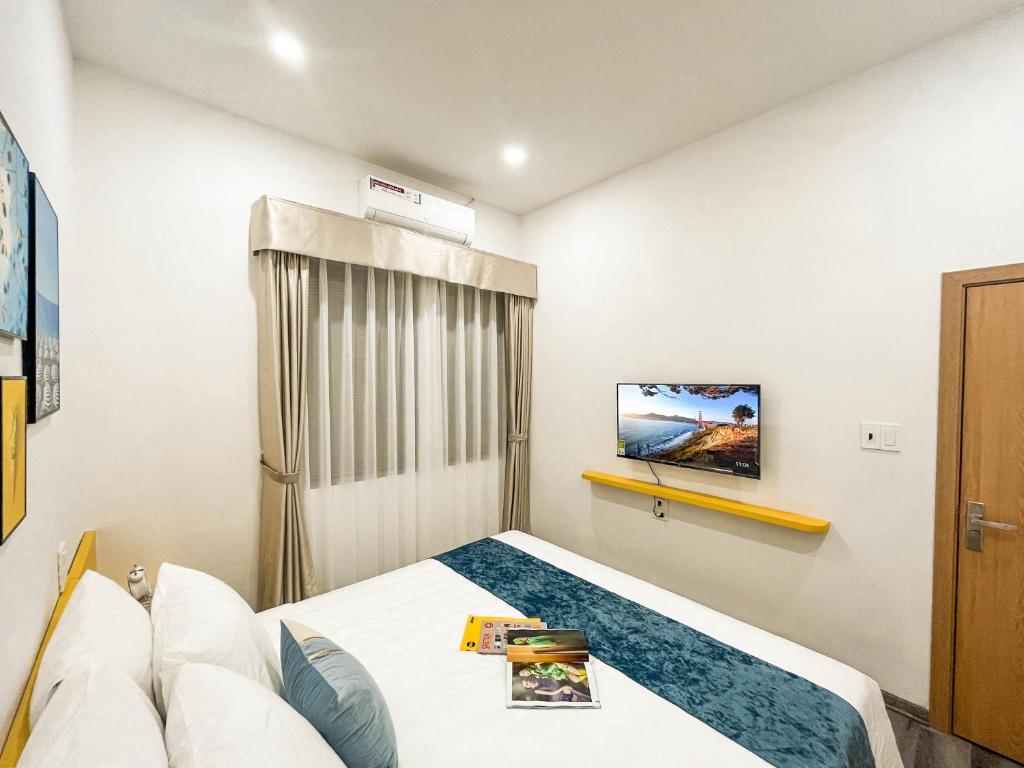 TV a/nebo společenská místnost v ubytování Mango Apartment and Homestay - HaNoi railway station