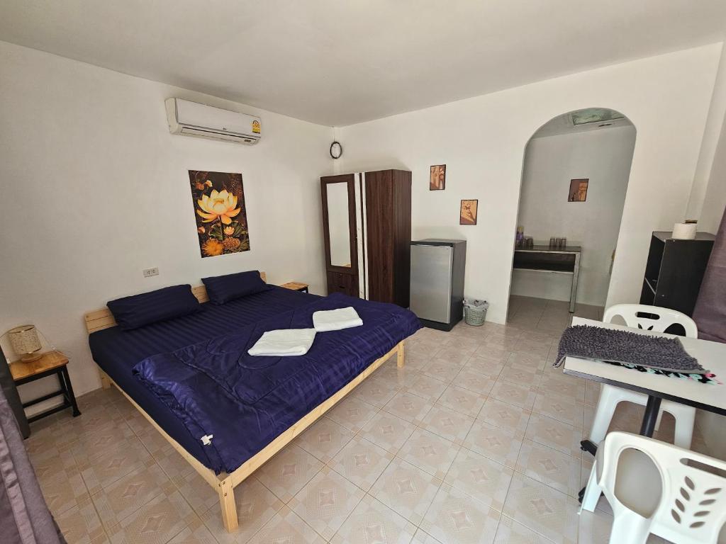 Postel nebo postele na pokoji v ubytování Baan Nok Koh Chang