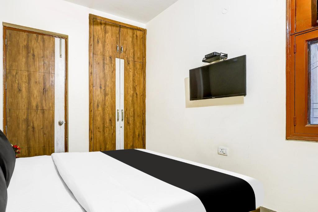 TV a/nebo společenská místnost v ubytování Super Hotel O Sector 52 Gurgaon