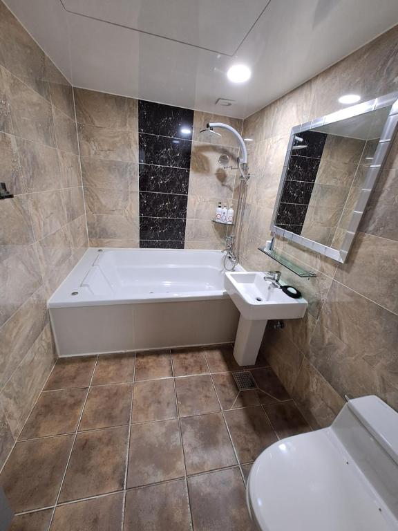 Koupelna v ubytování Asan Ritz Hotel