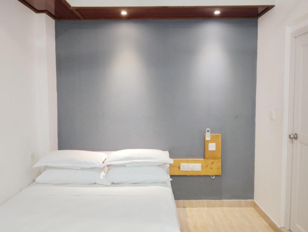 Postel nebo postele na pokoji v ubytování Kilavethi Retreat