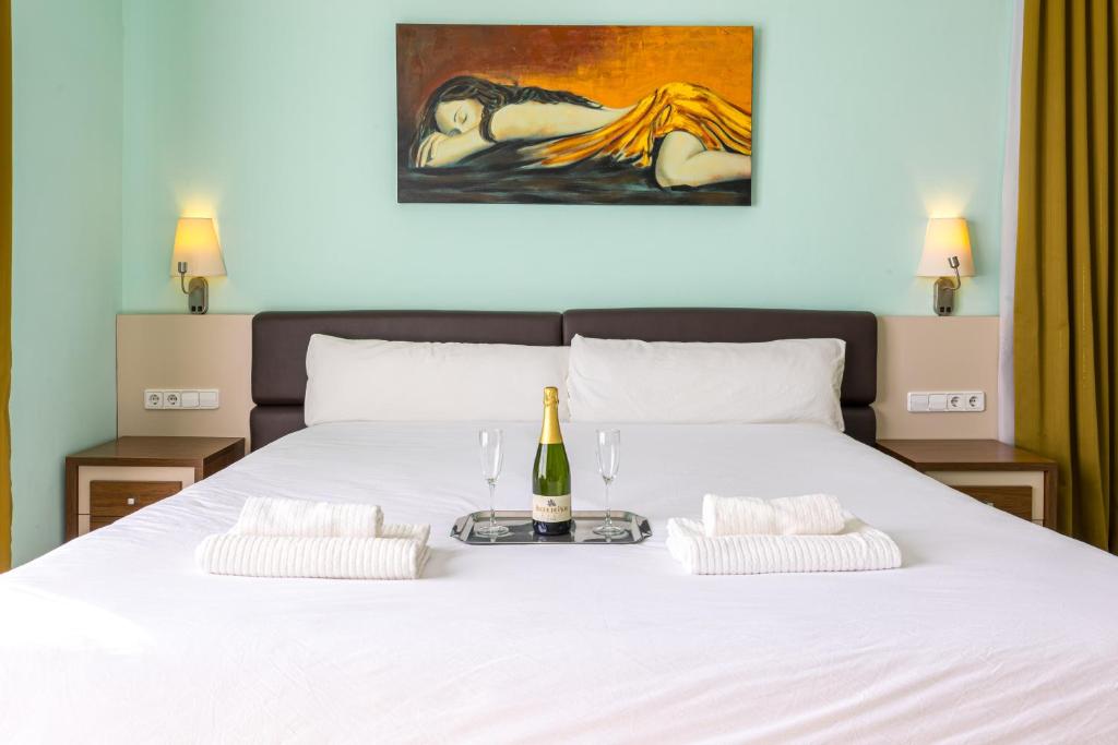 Postel nebo postele na pokoji v ubytování Hotel Llar de Capitans