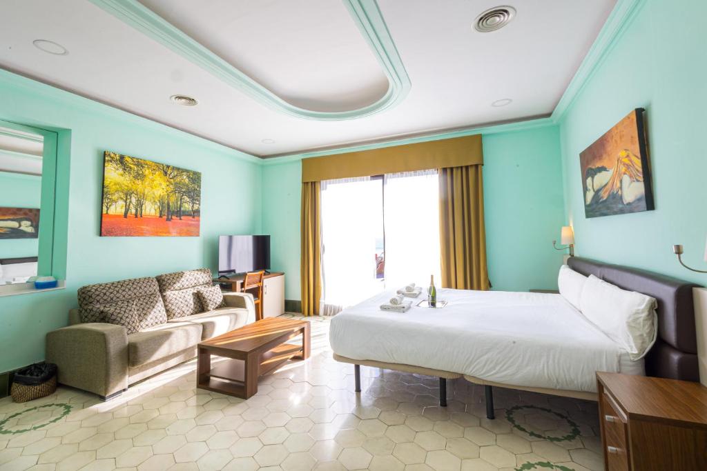 Postel nebo postele na pokoji v ubytování Hotel Llar de Capitans