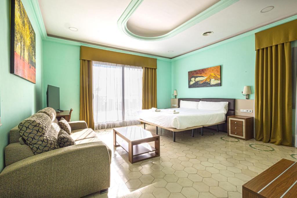 Postel nebo postele na pokoji v ubytování Hotel Llar de Capitans