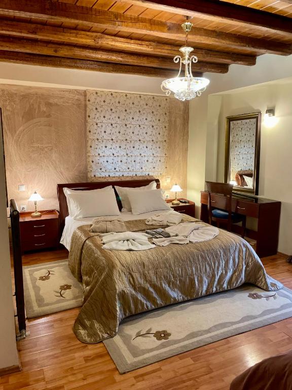 Postel nebo postele na pokoji v ubytování Guesthouse Stemnitsa