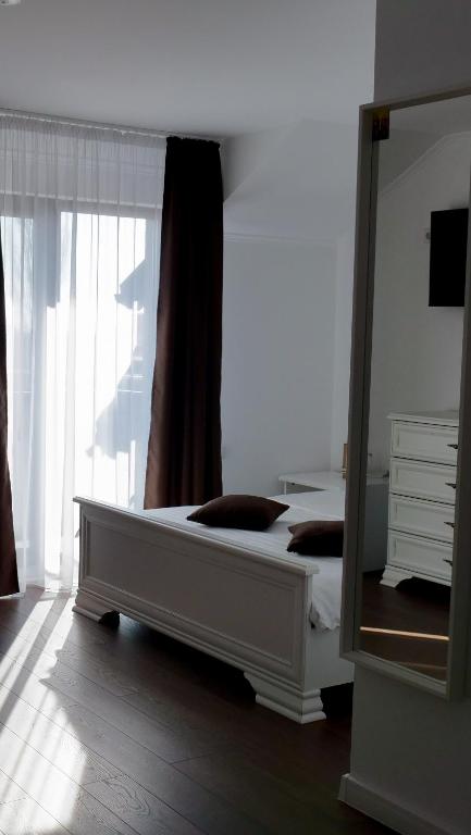 Postel nebo postele na pokoji v ubytování Casa Ambientt