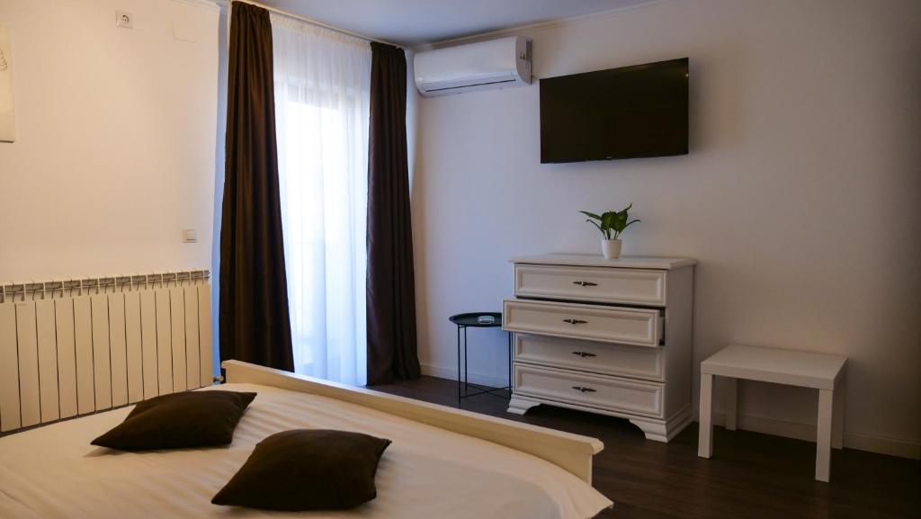 Postel nebo postele na pokoji v ubytování Casa Ambientt