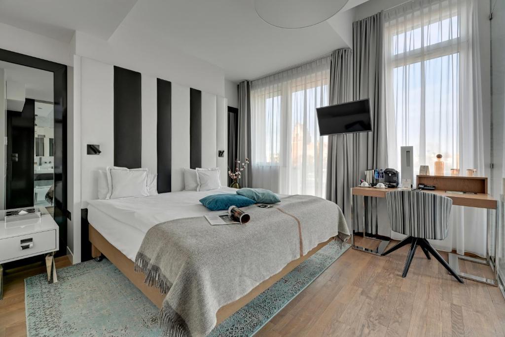 Posteľ alebo postele v izbe v ubytovaní HOTEL ALMOND BUSINESS & SPA BY GRANO - GRANO HOTEL Gdańsk Riverside