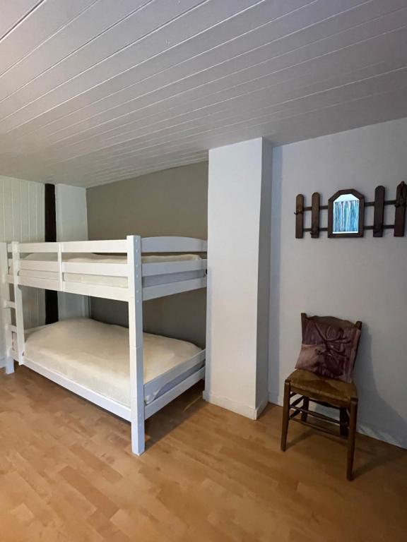 Postel nebo postele na pokoji v ubytování Gîte la Passerelle à Mouzaive