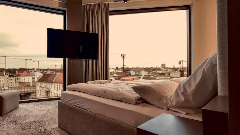 TV a/nebo společenská místnost v ubytování Bellman Hotel