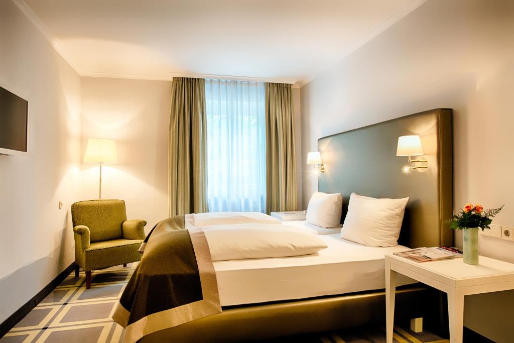 Postel nebo postele na pokoji v ubytování Hotel SchreiberHof