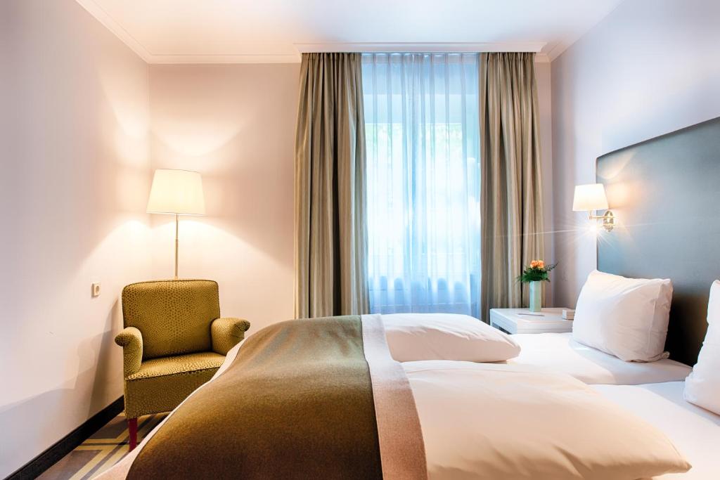 Postel nebo postele na pokoji v ubytování Hotel SchreiberHof