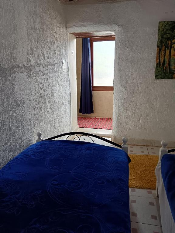 Postel nebo postele na pokoji v ubytování Relais De Tahla