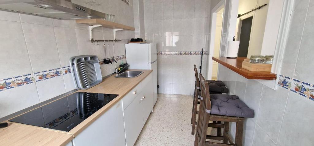 Kuchnia lub aneks kuchenny w obiekcie apartamento céntrico jerez calle tucan n17
