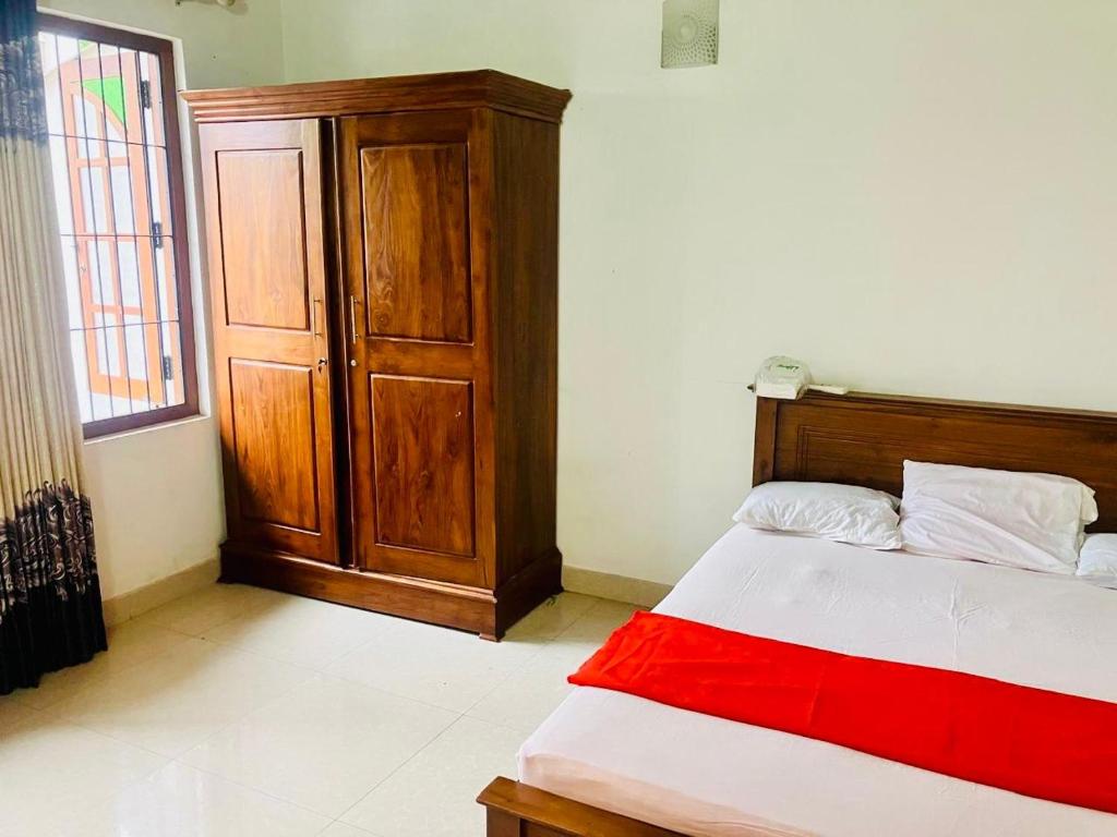 Postel nebo postele na pokoji v ubytování Colombo view inn