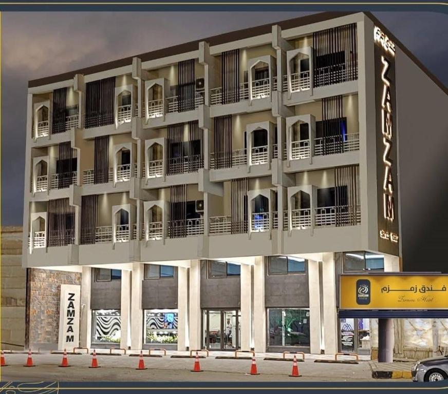 a building with balconies on the side of it at Zamzam Hotel 1 in An Najaf