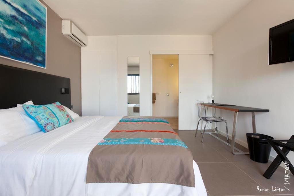 Postel nebo postele na pokoji v ubytování Hotel Ker Alberte