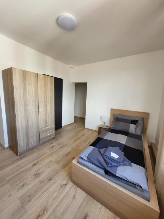 Postel nebo postele na pokoji v ubytování City Center Apartments - Moderna Brno Římské náměstí I