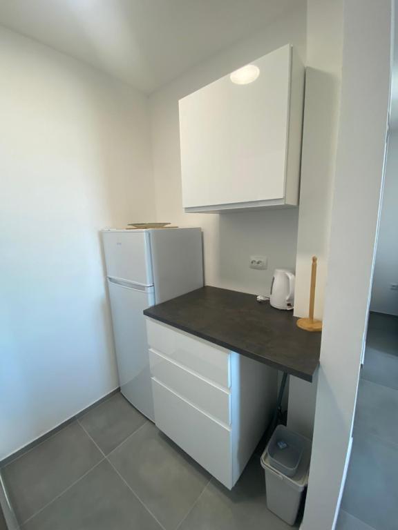 Kuchyň nebo kuchyňský kout v ubytování Casa Maslina - 2