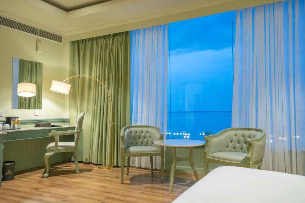 Grandeeza Hotel by Galisonにあるベッド