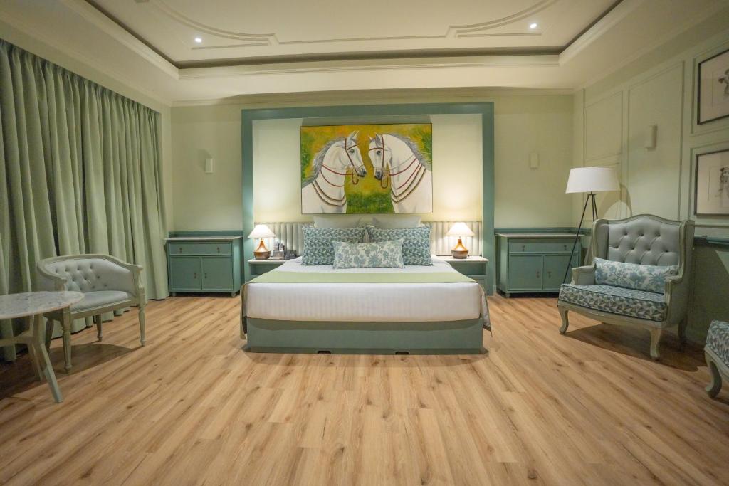 Grandeeza Hotel by Galisonにあるベッド