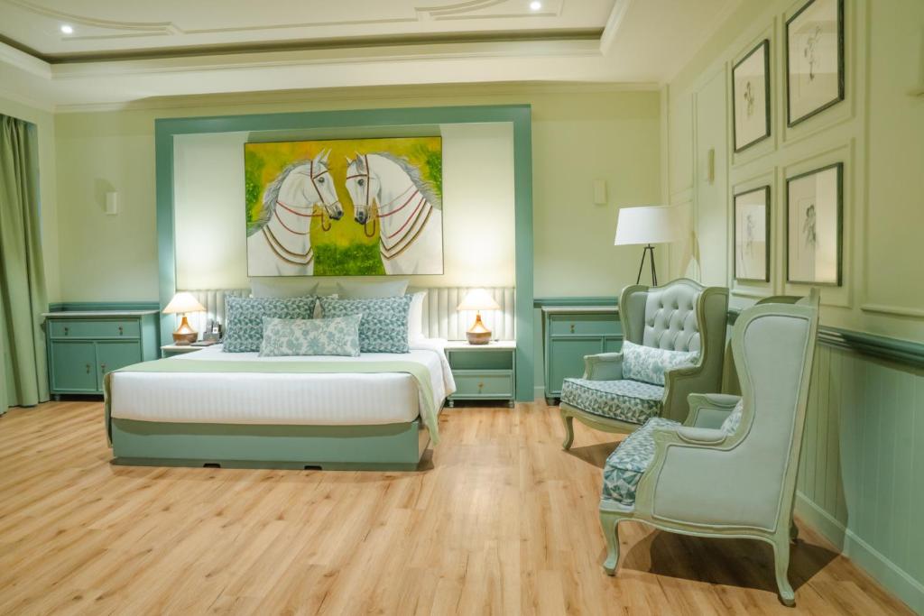 Grandeeza Hotel by Galisonにあるベッド