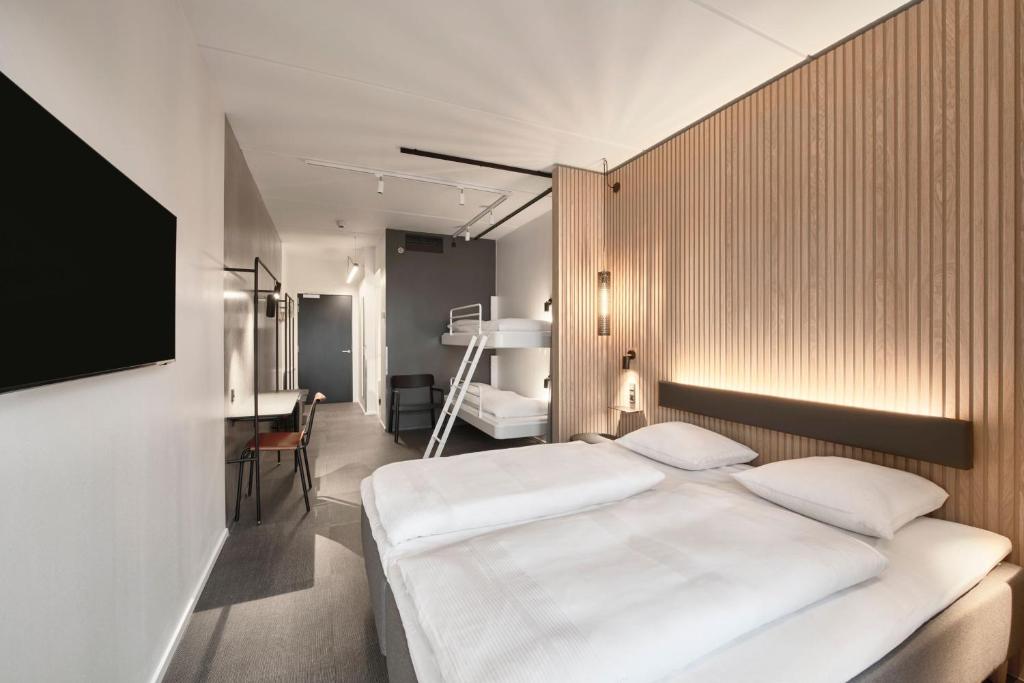 Postel nebo postele na pokoji v ubytování Four Points Flex by Sheraton Vejle