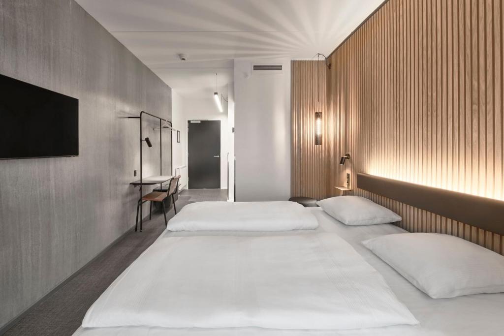 Postel nebo postele na pokoji v ubytování Four Points Flex by Sheraton Vejle