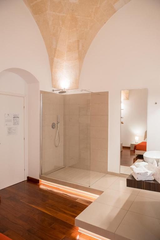 Postel nebo postele na pokoji v ubytování Tulliani Residenze Matera